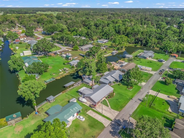 718 Crk 467, Lake Panasoffkee, FL 33538 - view of property location with a forest, a large body of water, and nearby suburban area