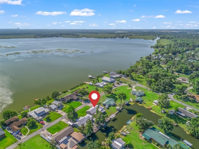 718 Crk 467, Lake Panasoffkee, FL 33538 - aerial overview of property's location featuring a nearby body of water and nearby suburban area