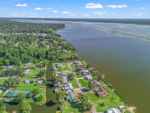 718 Crk 467, Lake Panasoffkee, FL 33538 - aerial view of property's location featuring a large body of water and nearby suburban area