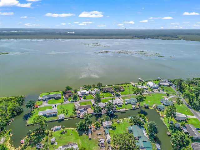 718 Crk 467, Lake Panasoffkee, FL 33538 - aerial view of property's location with a large body of water and nearby suburban area