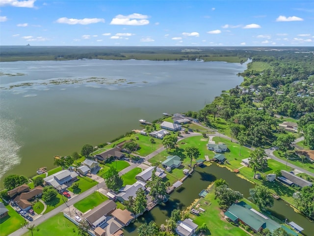 718 Crk 467, Lake Panasoffkee, FL 33538 - aerial view of property's location with a large body of water and nearby suburban area