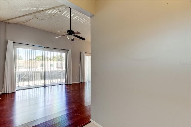 2932 Lichen Ln Unit D, Clearwater, FL 33760 - unfurnished room with wood finished floors, a ceiling fan, and baseboards