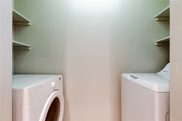 2932 Lichen Ln Unit D, Clearwater, FL 33760 - washroom featuring washer and dryer