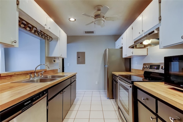 2932 Lichen Ln Unit D, Clearwater, FL 33760 - kitchen featuring stainless steel appliances, a sink, butcher block countertops, under cabinet range hood, and ceiling fan