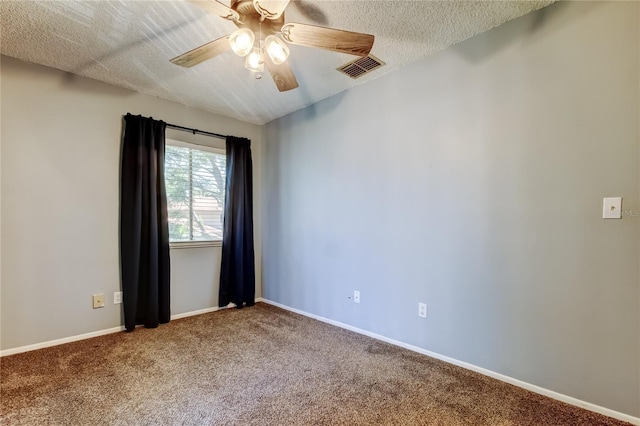 2932 Lichen Ln Unit D, Clearwater, FL 33760 - unfurnished room with carpet floors, a ceiling fan, a textured ceiling, and baseboards