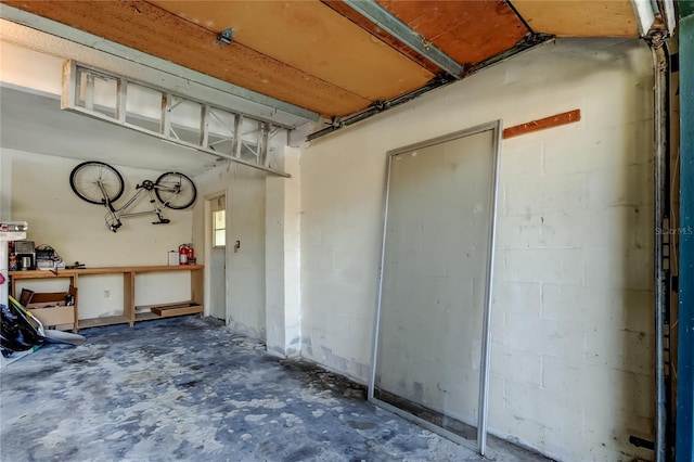 2932 Lichen Ln Unit D, Clearwater, FL 33760 - garage featuring concrete block wall