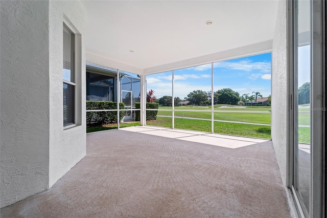 1130 Hominy Hill Dr, Trinity, FL 34655 - unfurnished sunroom featuring view of golf course
