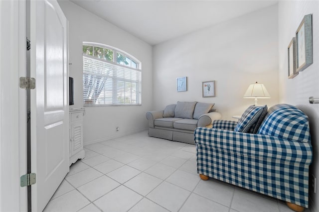 1130 Hominy Hill Dr, Trinity, FL 34655 - living area featuring light tile patterned floors and baseboards