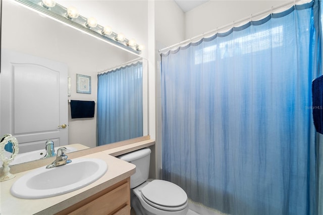 1130 Hominy Hill Dr, Trinity, FL 34655 - bathroom featuring vanity, toilet, and a shower with curtain