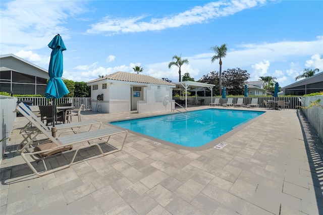 1130 Hominy Hill Dr, Trinity, FL 34655 - community pool with a patio