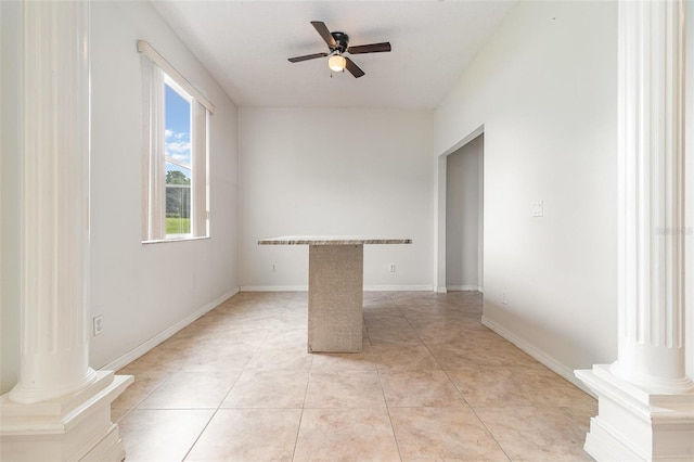 239 Beacon Pointe Dr, Ocoee, FL 34761 - unfurnished room featuring decorative columns, a ceiling fan, light tile patterned flooring, and baseboards