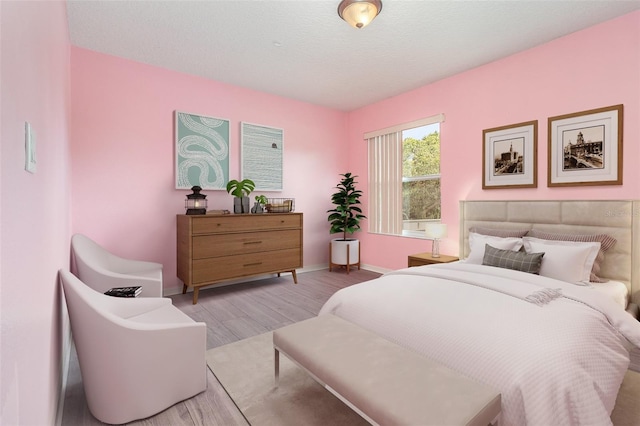 239 Beacon Pointe Dr, Ocoee, FL 34761 - bedroom with wood finished floors and baseboards