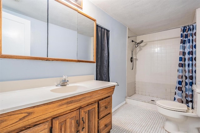 7347 Pulsar St, New Port Richey, FL 34652 - full bath with toilet, vanity, a shower stall, tile patterned flooring, and a textured ceiling