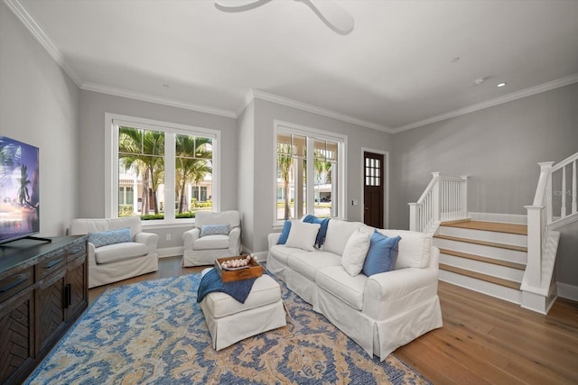 12 Country Club Ln, Belleair, FL 33756 - living room featuring wood finished floors, baseboards, stairs, crown molding, and a ceiling fan