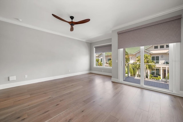 12 Country Club Ln, Belleair, FL 33756 - empty room featuring ceiling fan, wood finished floors, baseboards, and crown molding