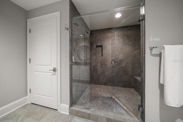 12 Country Club Ln, Belleair, FL 33756 - bathroom with a shower stall, baseboards, and recessed lighting