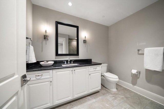 12 Country Club Ln, Belleair, FL 33756 - bathroom with vanity, toilet, baseboards, and recessed lighting