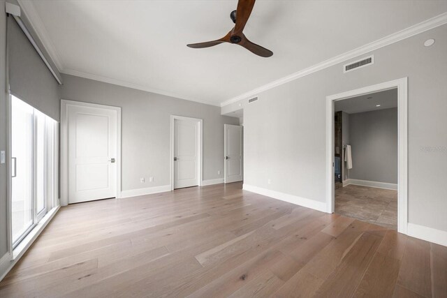 12 Country Club Ln, Belleair, FL 33756 - unfurnished room with a ceiling fan, light wood-style flooring, ornamental molding, and baseboards