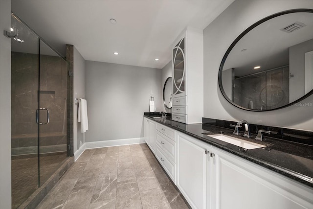 12 Country Club Ln, Belleair, FL 33756 - full bath with double vanity, baseboards, a stall shower, and recessed lighting