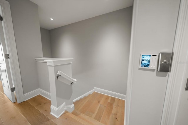 12 Country Club Ln, Belleair, FL 33756 - staircase with wood finished floors, baseboards, and recessed lighting
