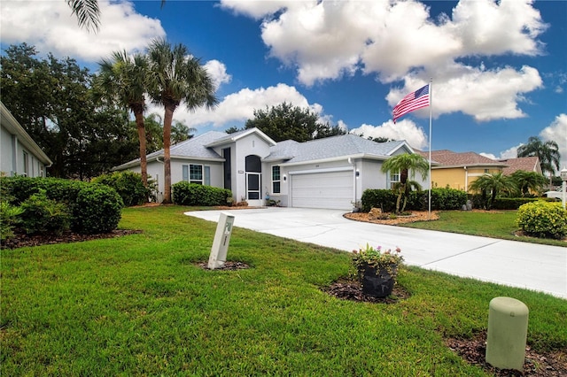 2121 Worthington Greens Dr, Sun City Center, FL 33573 - single story home featuring a garage, stucco siding, a front lawn, and driveway