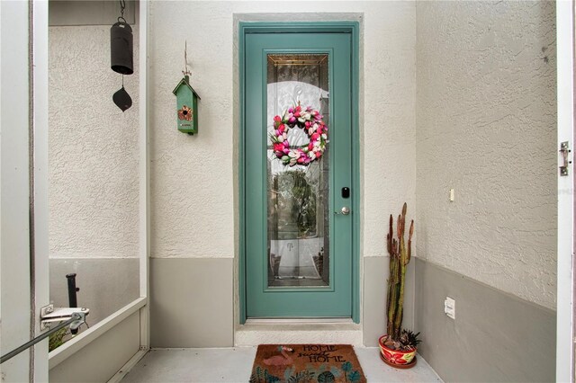2121 Worthington Greens Dr, Sun City Center, FL 33573 - entrance to property featuring stucco siding