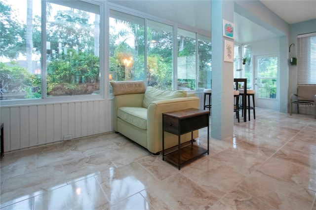 2121 Worthington Greens Dr, Sun City Center, FL 33573 - sunroom / solarium featuring marble finish floors