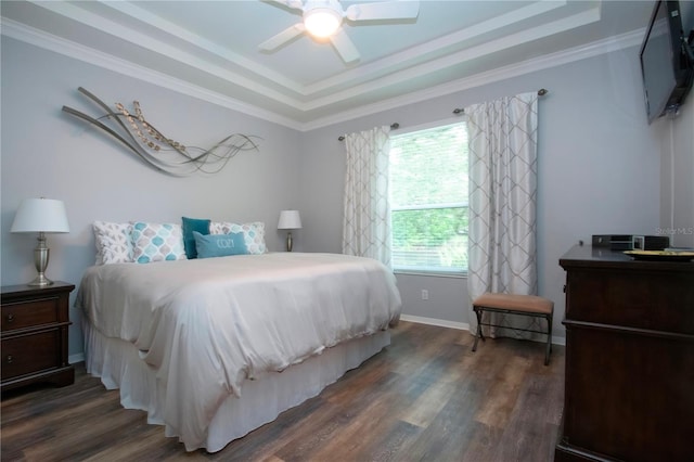 2121 Worthington Greens Dr, Sun City Center, FL 33573 - bedroom featuring a tray ceiling, wood finished floors, crown molding, and a ceiling fan