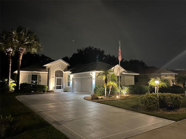 2121 Worthington Greens Dr, Sun City Center, FL 33573 - single story home with an attached garage, driveway, and stucco siding