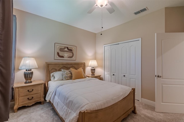 347 Cockle Shell Loop, Apollo Beach, FL 33572 - bedroom with light colored carpet, a closet, a ceiling fan, and baseboards