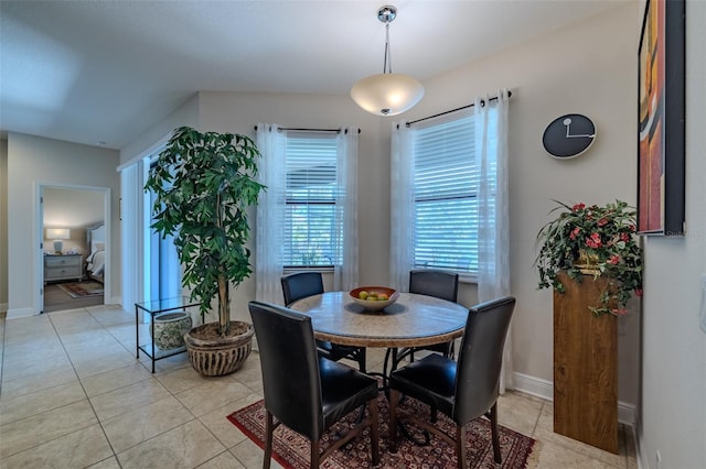 347 Cockle Shell Loop, Apollo Beach, FL 33572 - dining space with light tile patterned floors and baseboards