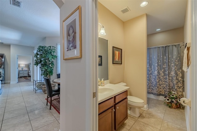 347 Cockle Shell Loop, Apollo Beach, FL 33572 - bathroom with vanity, tile patterned flooring, toilet, curtained shower, and recessed lighting