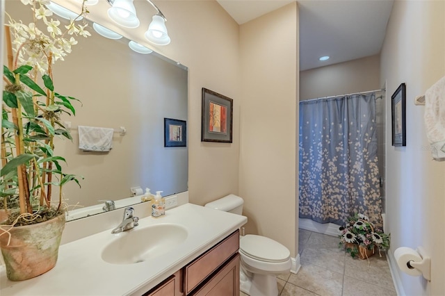 347 Cockle Shell Loop, Apollo Beach, FL 33572 - bathroom with toilet, vanity, tile patterned flooring, and a shower with curtain