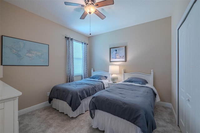 347 Cockle Shell Loop, Apollo Beach, FL 33572 - bedroom featuring light colored carpet, baseboards, a closet, and ceiling fan