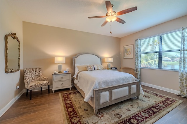347 Cockle Shell Loop, Apollo Beach, FL 33572 - bedroom with wood finished floors, baseboards, and a ceiling fan