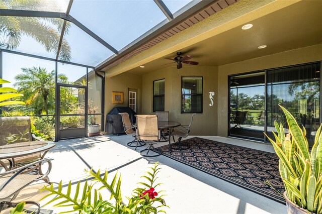 347 Cockle Shell Loop, Apollo Beach, FL 33572 - sunroom / solarium with ceiling fan, outdoor dining space, and plenty of natural light