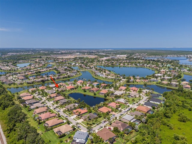 347 Cockle Shell Loop, Apollo Beach, FL 33572 - aerial view of property's location with nearby suburban area and a large body of water