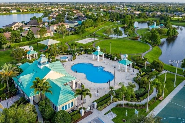 347 Cockle Shell Loop, Apollo Beach, FL 33572 - aerial perspective of suburban area featuring a large body of water and a pool area