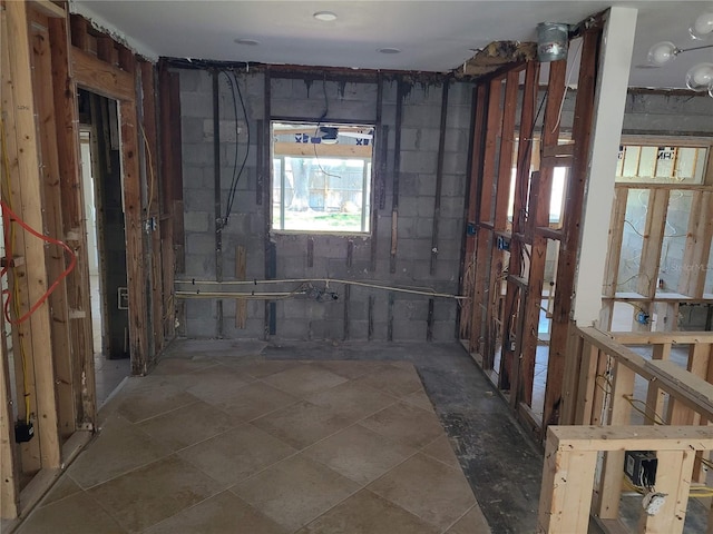 860 Bruce Ave, Clearwater Beach, FL 33767 - miscellaneous room featuring concrete block wall