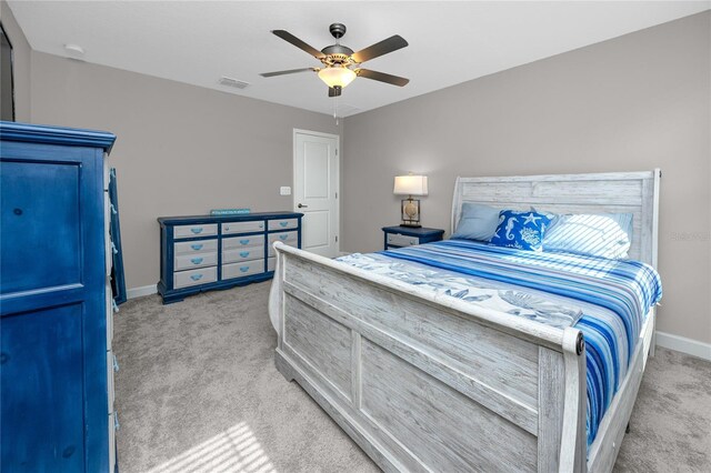 11320 Chilly Water Ct, Riverview, FL 33569 - bedroom featuring light carpet, baseboards, and a ceiling fan