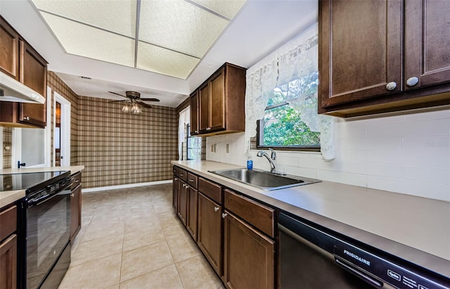 1648 Concord St, Dunedin, FL 34698 - kitchen with dishwashing machine, electric range, a sink, dark brown cabinetry, and wallpapered walls