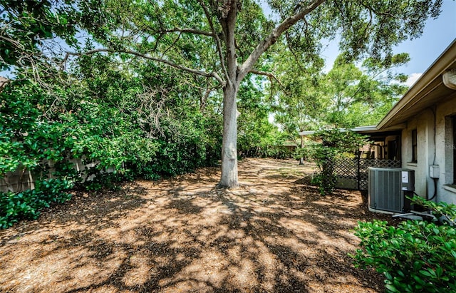 1648 Concord St, Dunedin, FL 34698 - view of yard featuring central AC unit