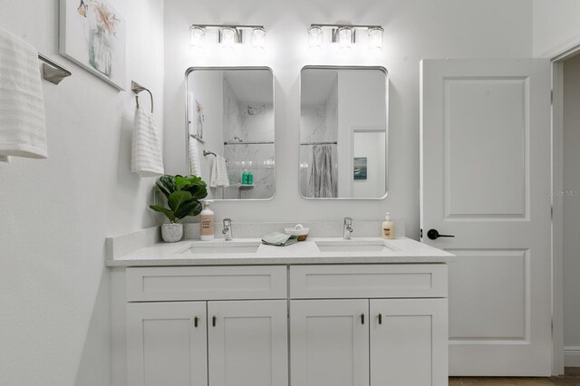 5229 Chaney Ter, Port Charlotte, FL 33981 - bathroom with double vanity and a shower