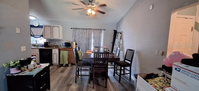 1160 W Geneva Pl, Citrus Springs, FL 34434 - dining area featuring ceiling fan and wood finished floors