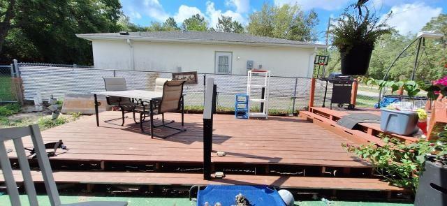 1160 W Geneva Pl, Citrus Springs, FL 34434 - deck featuring outdoor dining area