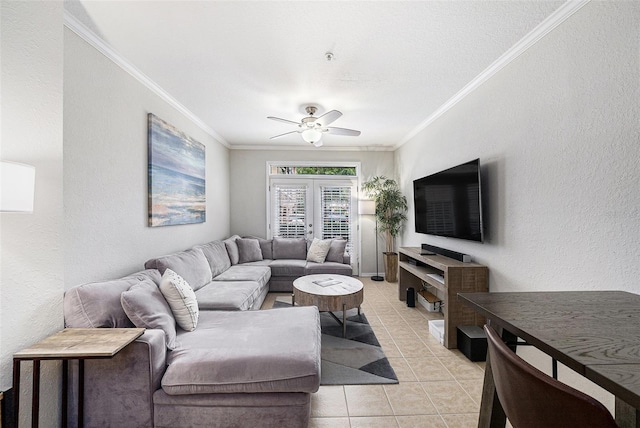 4221 W Spruce St Unit 2104, Tampa, FL 33607 - living room with crown molding, ceiling fan, light tile patterned flooring, and a textured wall