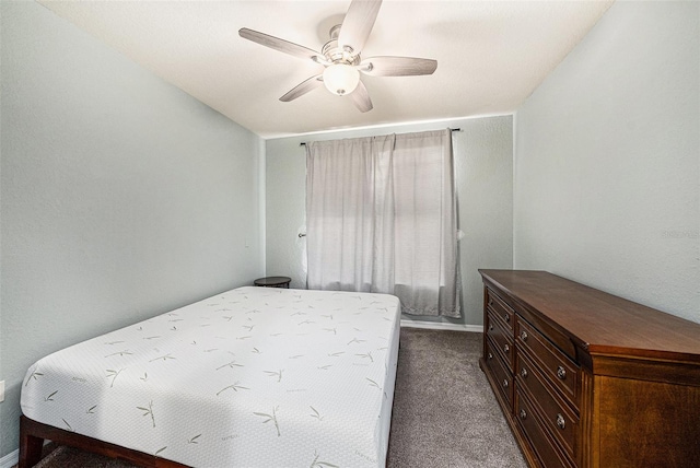 4221 W Spruce St Unit 2104, Tampa, FL 33607 - bedroom with dark colored carpet and a ceiling fan