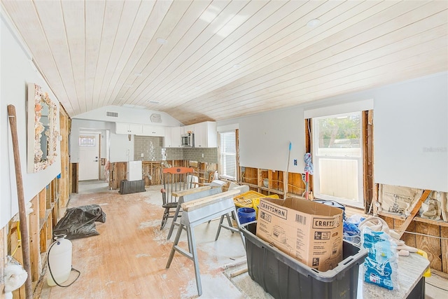 112 11th Ave, Indian Rocks Beach, FL 33785 - dining room featuring lofted ceiling, wooden ceiling, and light wood-style floors