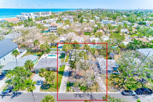 112 11th Ave, Indian Rocks Beach, FL 33785 - aerial view of residential area featuring property parcel outlined and a nearby body of water