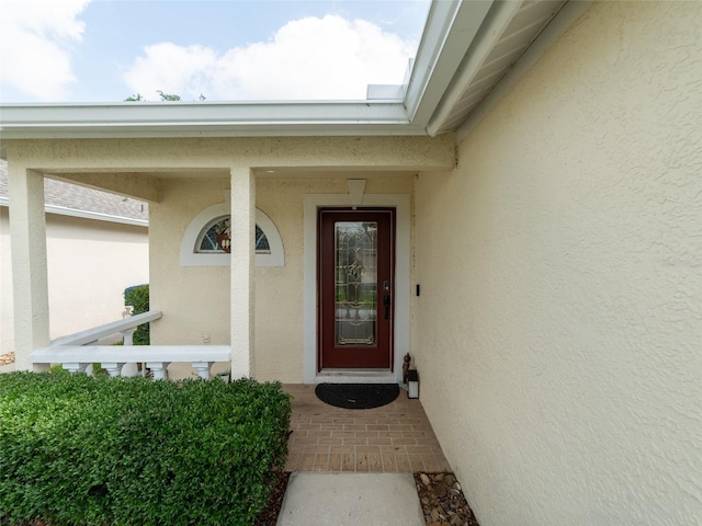 31201 Shaker Cir, Wesley Chapel, FL 33543 - view of exterior entry featuring stucco siding